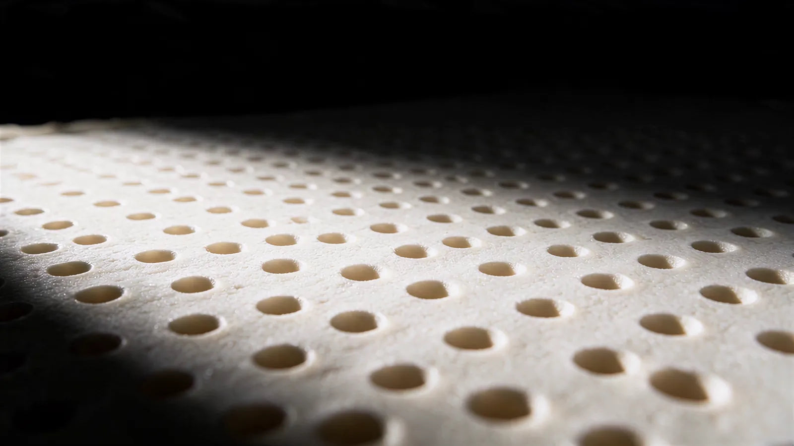 Espuma de látex natural con perforaciones